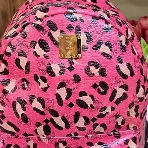 MCM | Bags | Mcm Vibrant Pink Animal Print Backpack | Poshmark display picture 1